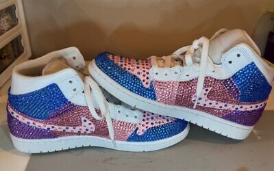 These high tops were designed to match a bat mitzvah dress and were preserved as keepsakes.
