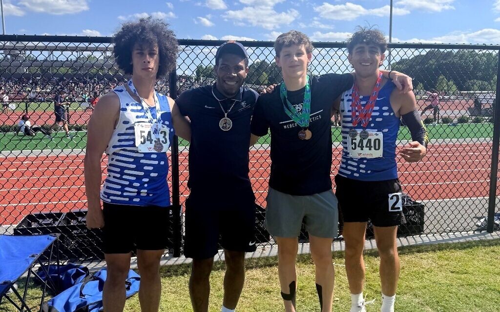 The Weber School track & field state medalists, from left: Eli Clark, Coach Trey Carson, Ryan Kasmen, Nuriel Shimoni-Stoil // Photo Credit: Trey Carson