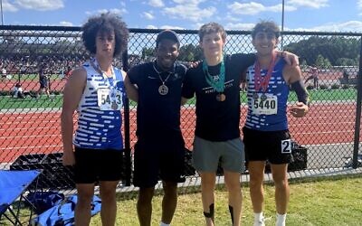 The Weber School track & field state medalists, from left: Eli Clark, Coach Trey Carson, Ryan Kasmen, Nuriel Shimoni-Stoil // Photo Credit: Trey Carson