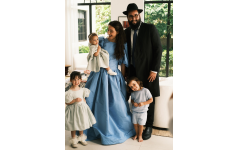 Rabbi Mendel and Itty Wuensch with their three children, Riva, Meir, and Rachel, look forward to their move to Buckhead.