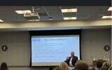 Arthur Povlot (standing), founder of College2Career, says many families are working from an outdated understanding of today's hiring landscape