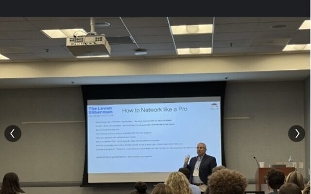 Arthur Povlot (standing), founder of College2Career, says many families are working from an outdated understanding of today's hiring landscape