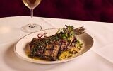 The Branzino was topped with green chimichurri sauce // Photo Credit: Angie Webb