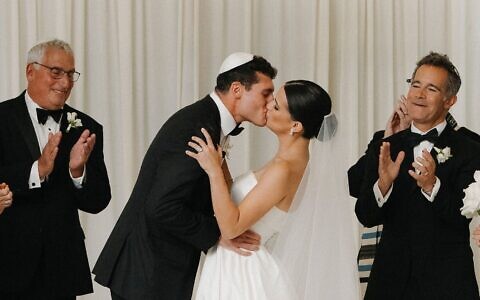 Lindsey Rottner and Jared Parker shared their first kiss as husband and wife // All photos by Kelsie Jones Photography