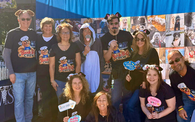 The AJT's Bark-B-Q Crew pictured in front of their booth. The AJT's Bark-B-Q Crew pictured in front of their booth.