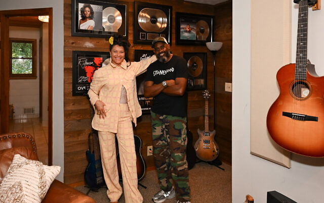 Pictured with spouse, Eric, her former banker, the couple worked together on a new album, “Retro in Real Time.”  