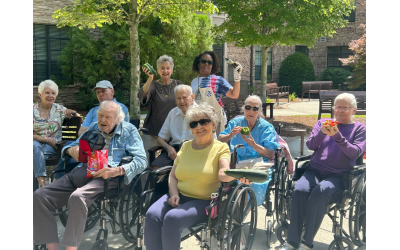 Residents at Berman Commons display some of the produce they grew in their Garden Club.