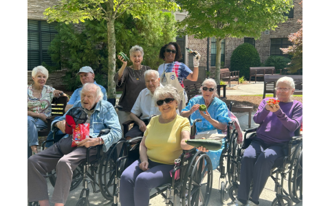 Residents at Berman Commons display some of the produce they grew in their Garden Club.