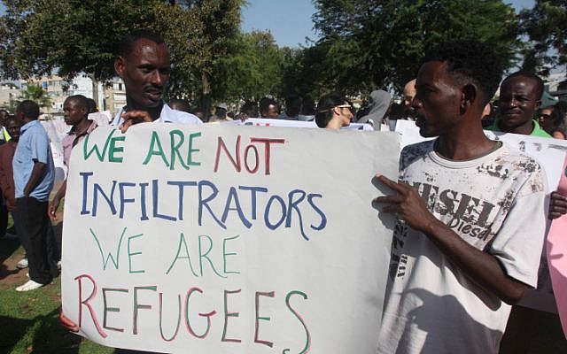 A group of South Sudanese refugees gather in Tel Aviv to protest against a deportation in June. (photo credit: Roni Schutzer/Flash90)