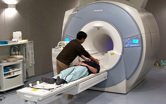 An fMRI scanner (illustrative photo: CC-BY-SA, JanneM, Flickr)