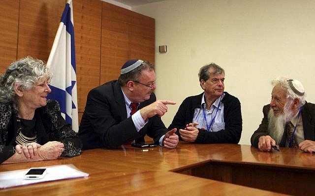 File: Former science minister Daniel Hershkowitz (second from left), in an unusual meeting in July 2012 with Israeli Nobel laureates. Participants included Ada Yonath (left), Aaron Ciechanover (second from right), and Israel Aumann (right). (photo credit: Gil Yohanan/Flash90)