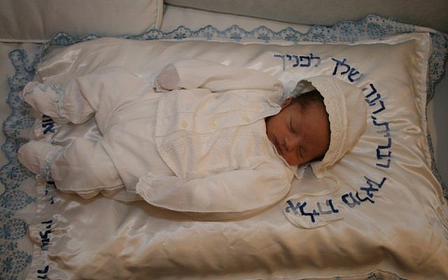Illustrative: A baby after the brit milah ceremony (Gershon Elinson/Flash90)