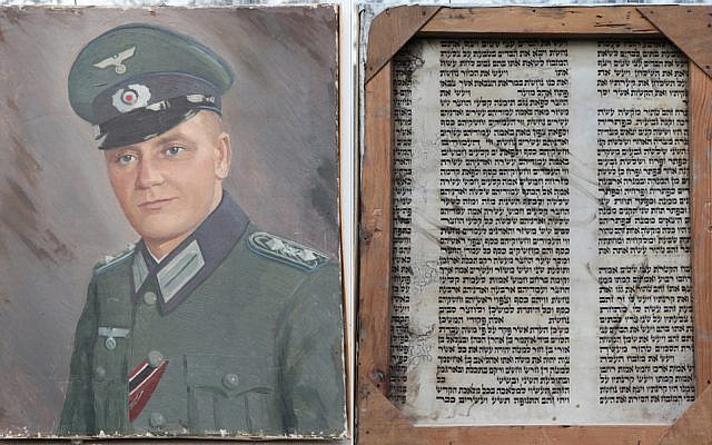 The painting of Alfred Mayer. On the right is a view of the back of the painting -- a section of Torah scroll. (photo credit: courtesy)