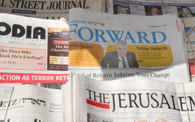 A close-up of newspapers on sale at a stand in Israel (photo credit: Sophie Gordon/Flash 90)