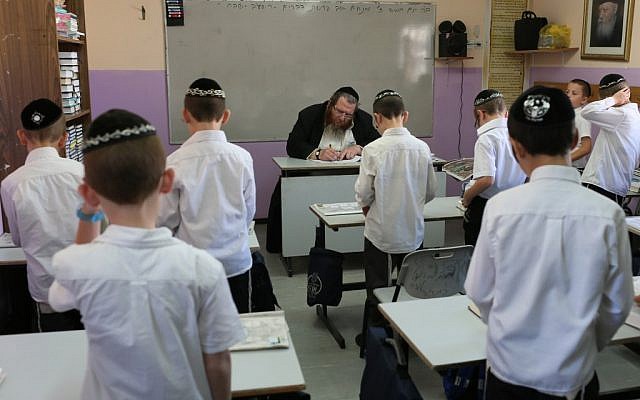 Ultra-Orthodox students seen learning in the classroom of a Haredi 'Talmud Torah' in the settlement of Beitar Illit. (Nati Shohat/ Flash90)