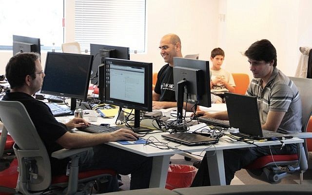 Entrepreneurs work at an accelerator in Herzliya (Photo credit: Courtesy)