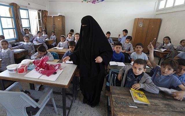 Palestinian children attend a class at the UNRWA elementary school in the Shati refugee camp in Gaza City, in April 2013. (AP/Hatem Moussa/File)