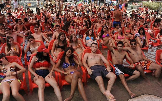 Sprawled in cherry-red chairs for the Coca-Cola Summer of Love festival (Courtesy Coca-Cola Israel)