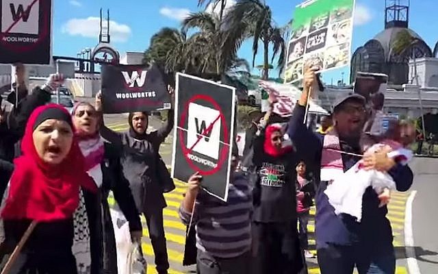 BDS activists rally outside a Woolworths department store (photo credit: YouTube screenshot)