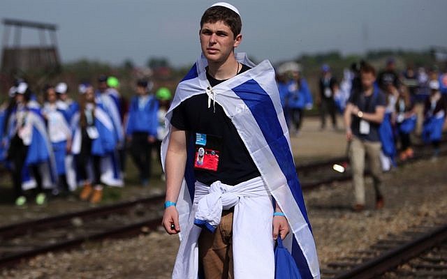 Jewish youth participating in the annual March of the Living commemoration at the Auschwitz-Birkenau concentration camp in Poland, April 24, 2014. (wjarek/Shutterstock)