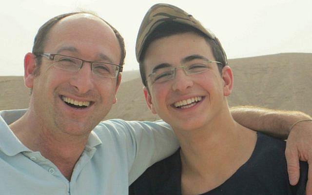 Ofir Shaer (left) with his son Gil-ad Shaer, who, together with Naftali Frenkel and Eyal Yifrah, was kidnapped and murdered by Palestinian terrorists in June 2014. (Courtesy)