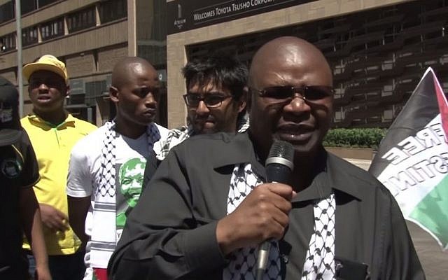 Obed Bapela (R), a deputy minister in South African President Jacob Zuma’s office, who threatened to summon students who visited Israel to an investigation. (YouTube)