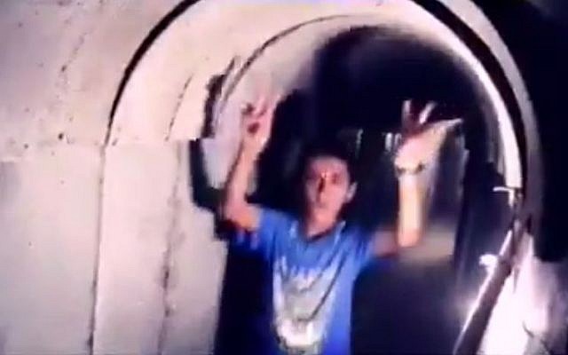 An image taken from a video on Hamas's Facebook page on July 20, 2016 shows Palestinian children inside a tunnel dug by the terror group in the Gaza Strip. (Screen capture from Facebook)