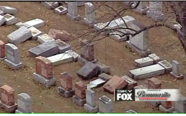 Video still of vandalized headstones in Chesed Shel Emeth Society cemetery in St. Louis, February 20, 2017. (Screen capture: FOX2NEWS via JTA)
