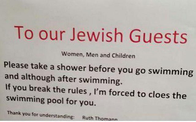 A sign put up at a Swiss hotel calling on Jewish guests to shower before going swimming (Courtesy)