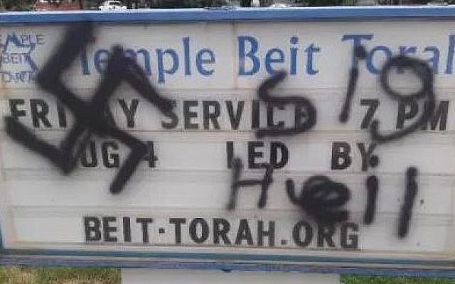 A swastika found on a sign outside Temple Beit Torah in Colorado springs on August 4, 2017. (Screen capture/KKTV)