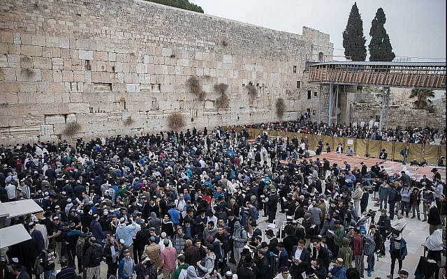 Illustrative: Jews gather at the Western Wall in Jerusalem's Old City to pray for rain, on December 28, 2017. (Flash90)