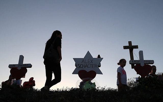 A makeshift memorial erected in front of Marjory Stoneman Douglas High School in Parkland, Fla., days after the shooting that left 17 students and teachers dead, February 18, 2018. (Joe Raedle/Getty Images)