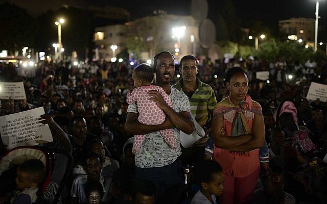 African migrants take part at a protest against the "Deposit Law" in Tel Aviv on June 10, 2017. African asylum seekers protest on Saturday against the "Deposit Law", following which Eritreans and Sudanese are required to deposit fifth percent of their salary. Photo by Tomer Neuberg/Flash90
