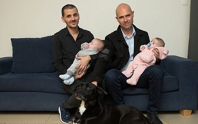 Ochana (to our right), presently the only openly gay MK (Likud), here with his partner and their two kids