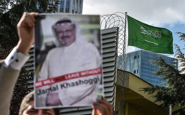 A protestor holds a picture of missing journalist Jamal Khashoggi during a demonstration in front of the Saudi Arabian consulate, on October 5, 2018 in Istanbul. - Jamal Khashoggi, a veteran Saudi journalist who has been critical towards the Saudi government has gone missing after visiting the kingdom's consulate in Istanbul on October 2, 2018, the Washington Post reported. (Photo by OZAN KOSE / AFP)        (Photo credit should read OZAN KOSE/AFP/Getty Images)
