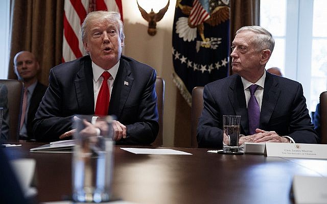 US Defense Secretary Jim Mattis, right, listens to President Donald Trump speak during a cabinet meeting at the White House on January 10, 2018. (AP Photo/Evan Vucci)