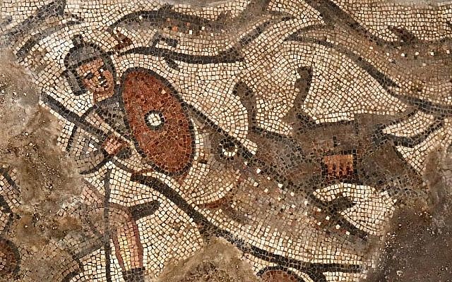 A fish swallows an Egyptian soldier in a mosaic scene depicting the splitting of the Red Sea from the Exodus story, from the fifth-century synagogue at Huqoq, in northern Israel. (Jim Haberman/University of North Carolina Chapel Hill)