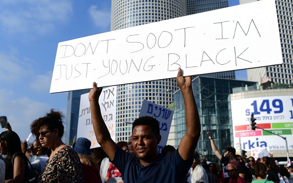 Demonstrators protest police violence and discrimination following the death of 19-year-old Ethiopian-Israeli Solomon Tekah who was shot and killed in Kiryat Haim by an off-duty police officer, in Tel Aviv, July 8, 2019 (Tomer Neuberg/Flash90)