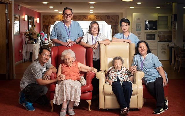 Daniel Carmel-Brown at Jewish Care's Otto Schiff home in Golders Green, with the carer team and residents Rita Tack (left) and Minnie Rowe (right)

(Blake Ezra photography - Jewish News)