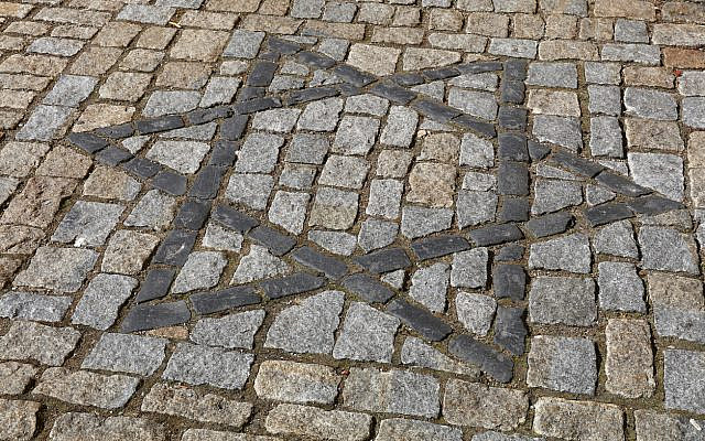 Illustrative. A Star of David, often a symbol of Jewish identity, on cobblestone paved road. (iStock)