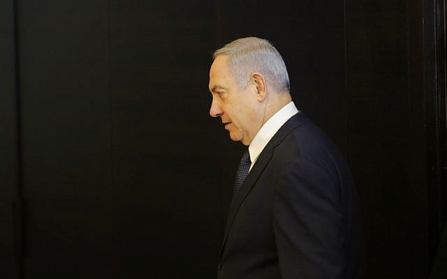 Prime Minister Benjamin Netanyahu arrives to deliver a statement regarding his intention to file a request to the Knesset for immunity from prosecution, in Jerusalem on January 1, 2020. (Gil Cohen-Magen/AFP)
