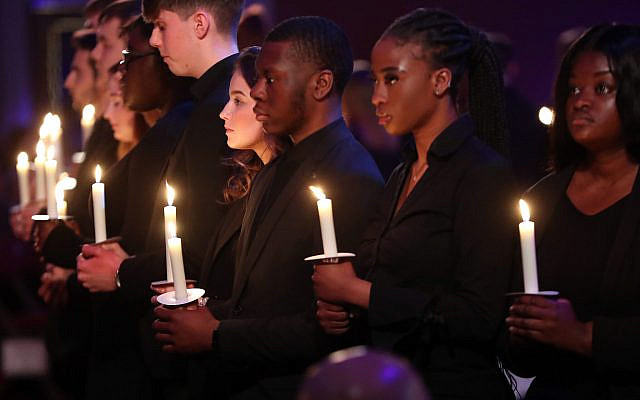 Candle lighting during the UK Holocaust Memorial Day Commemorative Ceremony at Central Hall in Westminster, London. (Photo credit: Chris Jackson/PA Wire via Jewish News)