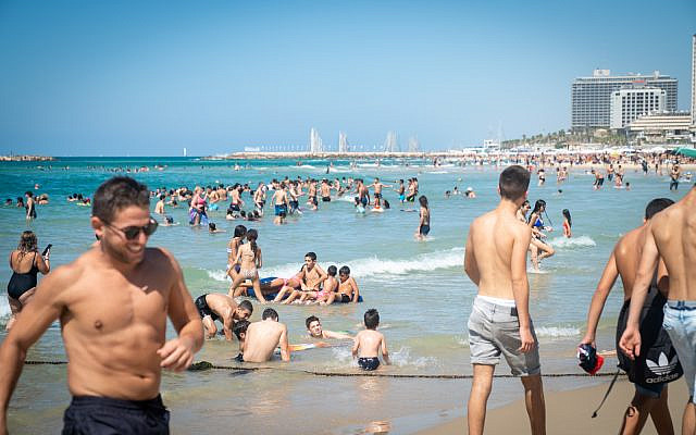 Israelis enjoy the Tel Aviv beach on Election Day, September 17, 2019. (Luke Tress/ The Times of Israel)