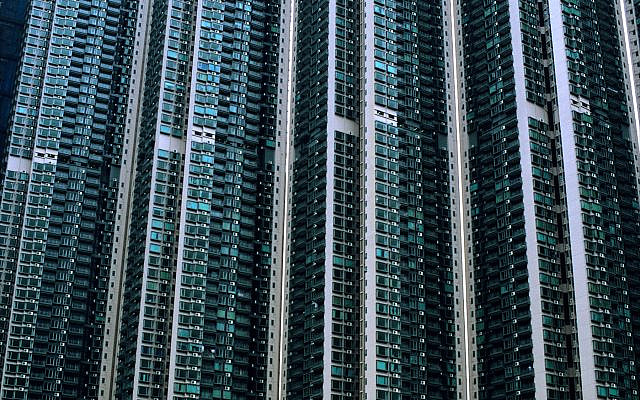 Residential skyscrapers in Hong Kong, whose 7.4 million people make it one of the world's most densely populated areas. Yet as of April 30, Hong Kong reported only 1,038 infections and four deaths from COVID-19. (Larry Luxner)