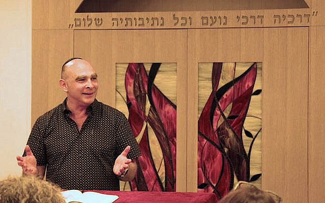 Rabbi Mikie Goldstein at Kehillat Adat Shalom-Emanuel in Rehovot. (Facebook / JTA Montage)