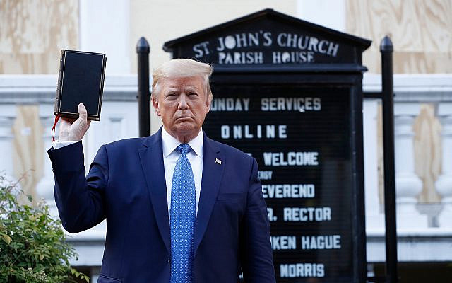 US President Donald Trump holds a Bible as he visits St. John's Church near Lafayette Park across from the White House in Washington, June 1, 2020. (AP/Patrick Semansky)