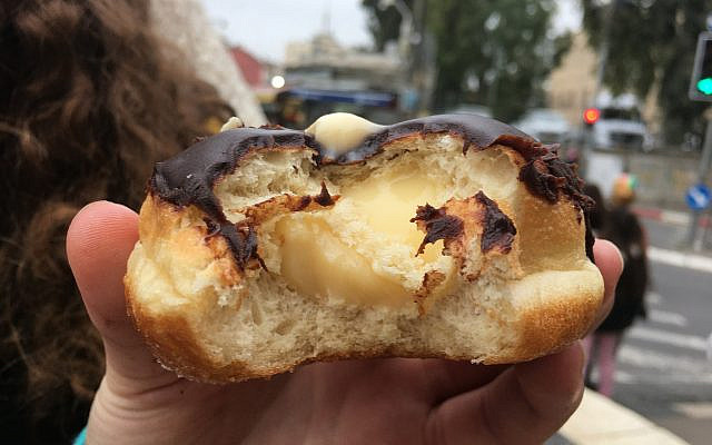 The mouth-watering cross-section of a Boston Creme sufganiyah. (courtesy)