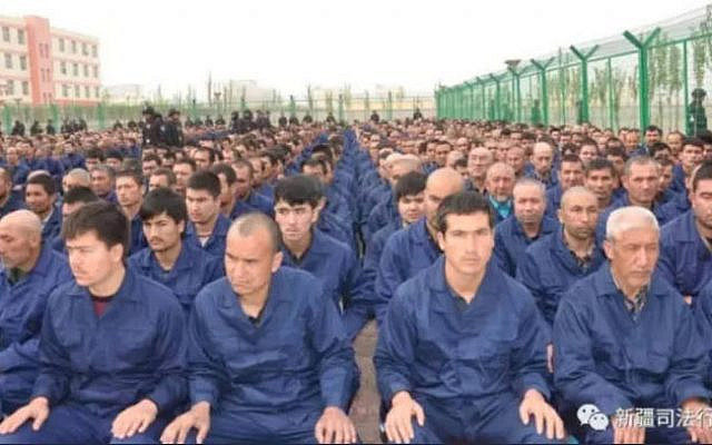 Uyghur men held in camps in north-west China. Estimates suggest more then one million Muslims are being held in such conditions. (Jewish News)