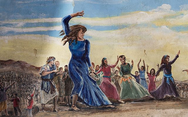 Miriam dances with the women of Israel. (via YouTube)