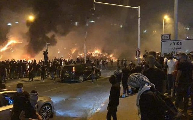 Scenes of rioting in Lod. (Twitter)